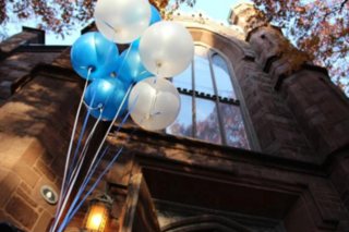 Multicultural Open House: blue and white balloons hanging from Dwight Hall