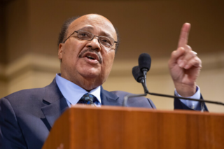 Martin Luther King III at a podium