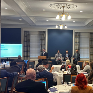 Yale Urology Inaugural Symposium, speakers at podium at the Yale Club