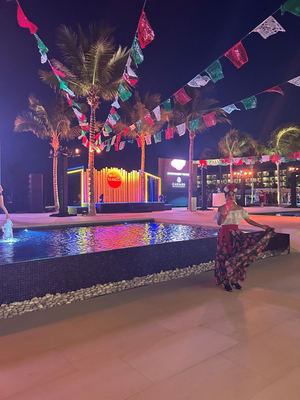 woman dancing outside near fountain 