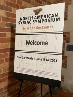 sign to welcome people to conference 